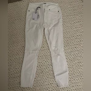 White Paige jeans size 28 with small rip in the knee
